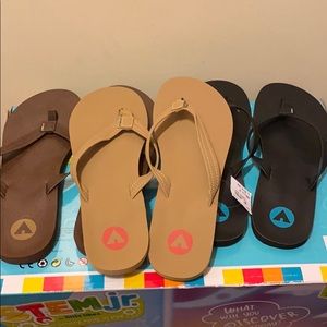 Three pair of flip flops